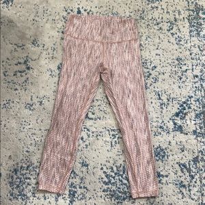 Lululemon leggings with a cute pink design